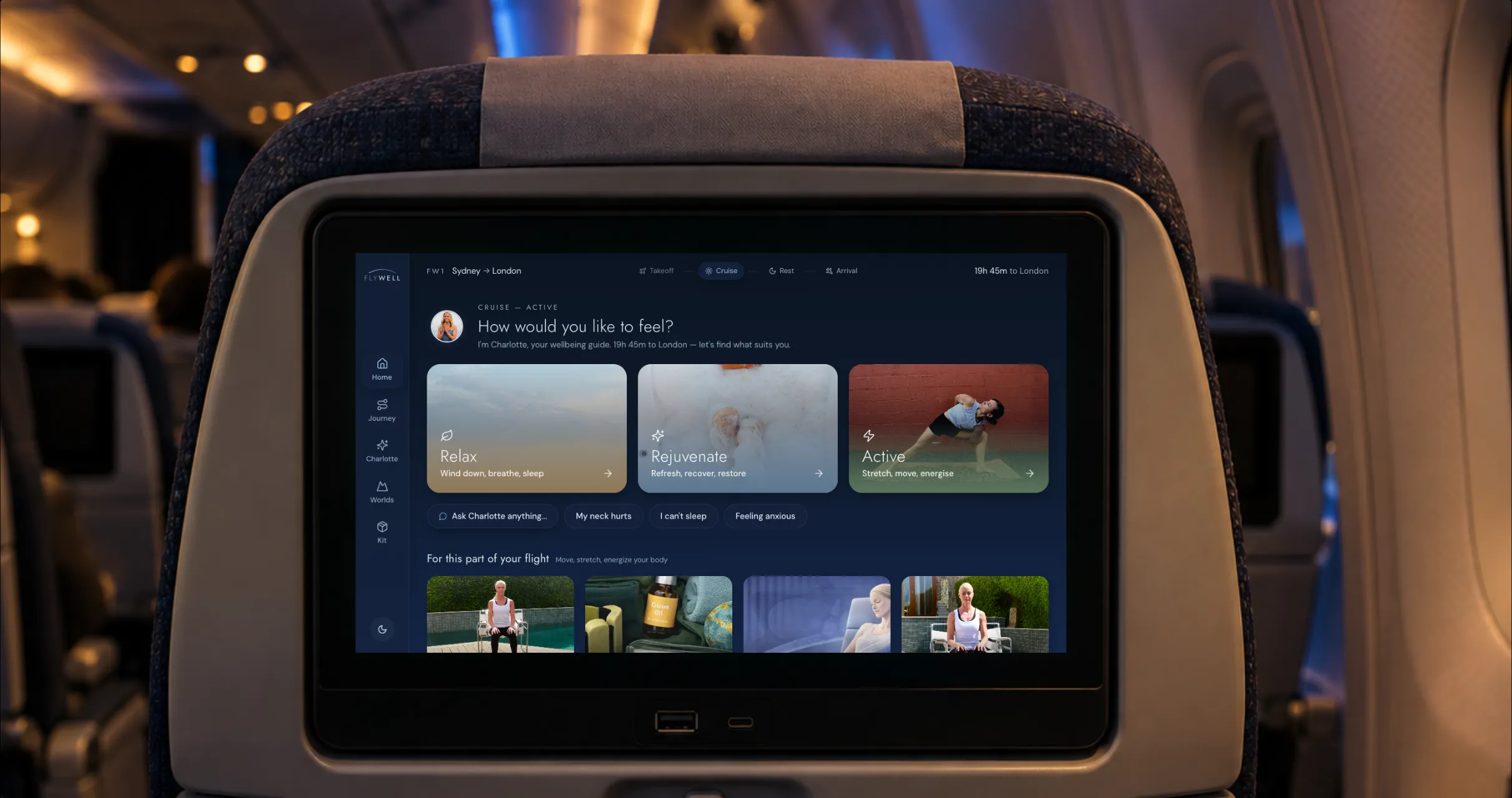 The Flywell home screen on a seatback display, asking the passenger how they would like to feel: relax, rejuvenate or active.